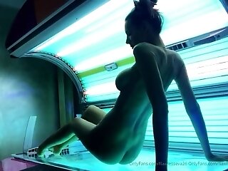 Big Tittied Honey Displaying Off Her Forms In The Tanning Salon